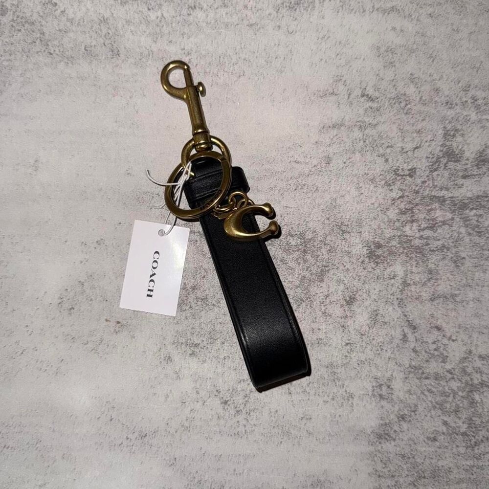 Coach black trigger snap keychain